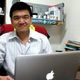 Jose Chong sitting in his office 