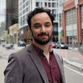 Daniel Sega walking on the street