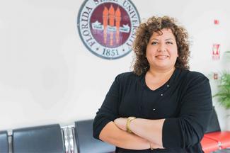 María del Rocío Grimaldo in front of the FSU Seal
